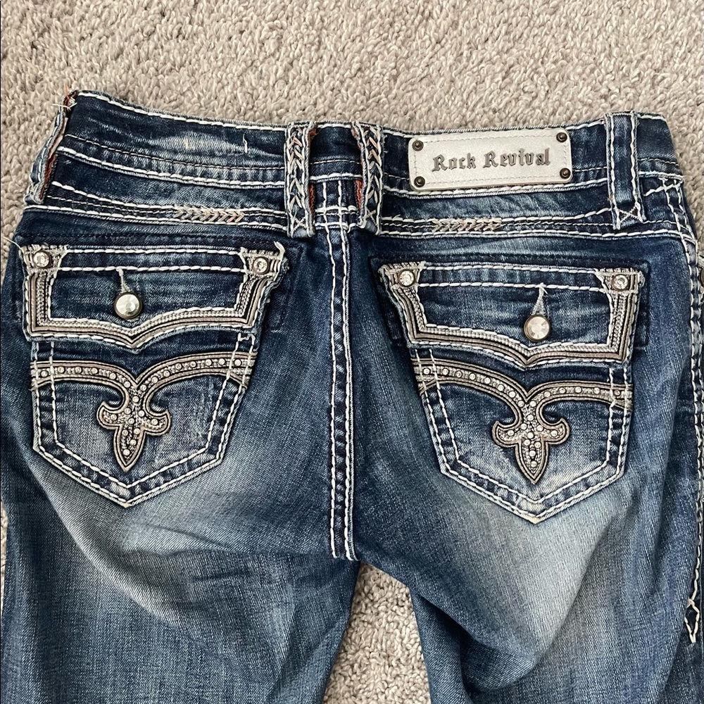 Bedazzled rock revival boot cut jeans